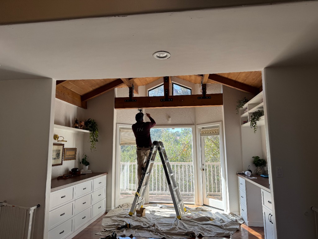 Installing the timber beam and brackets for the swing
